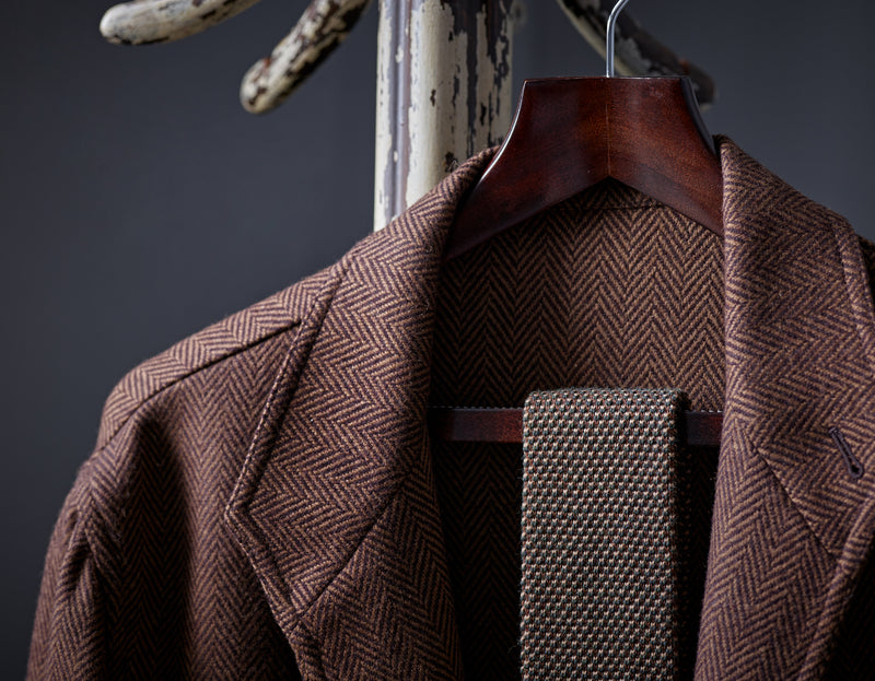 Mushroom, Cappuccino and Khaki Green Spot Wool Knitted Tie on Clothes Hanger & Jacket